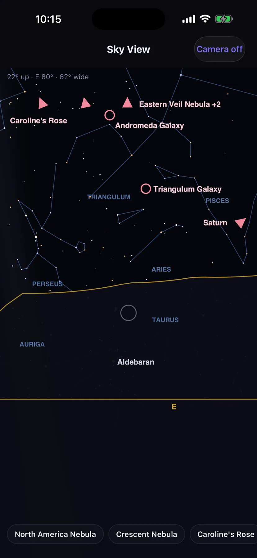 Sky View in Night Window: stars, constellation lines and tonight's targets, with the Andromeda and Triangulum galaxies labelled above a tree line to the east.